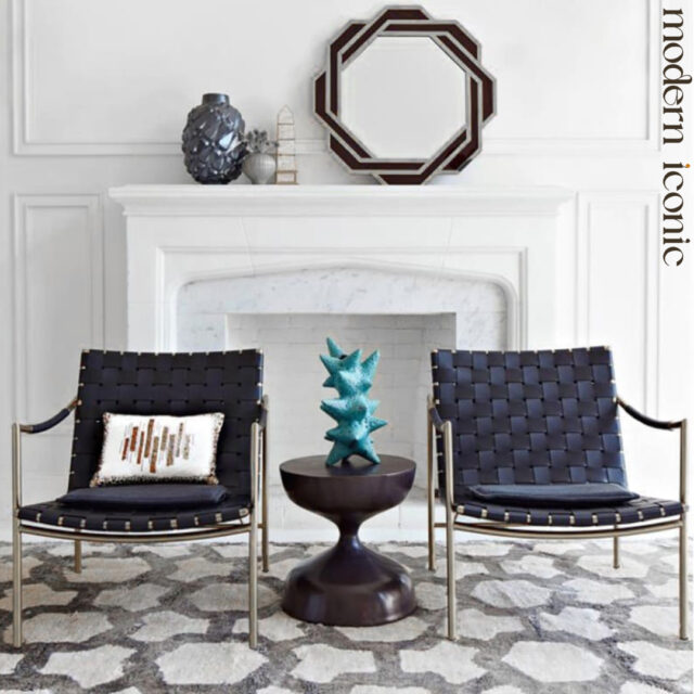 Perfect symmetry, perfect contrast. These woven leather lounge chairs in black bring refined texture and sculptural calm to any space. Paired with warm brass framing and a bold centrepiece, this setup is all about balance and bold minimalism.

Explore more at modern-iconic.co.uk
#ModernIconic #MidCenturyModern #MidCenturyDesign #MidCenturyFurniture #interiordesigninspiration #InteriorDesign
